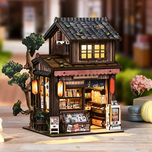 🌸🏠 Boutique miniature éclairée – Fleurs en devanture, lumière douce, l’esprit du printemps capturé dans une petite boîte à rêves 🌷✨
